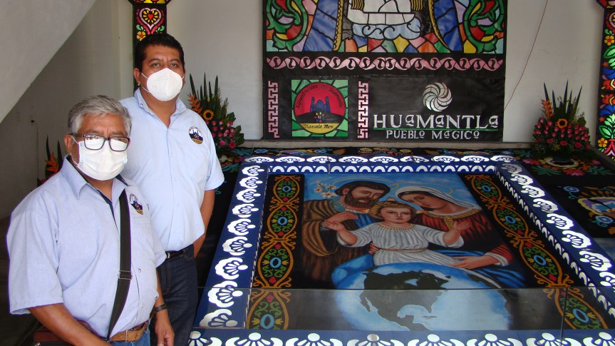 Alfombra con el Tema de la Divina familia protegiendo al mundo ante la pandemia, en&nbsp;Huamantla